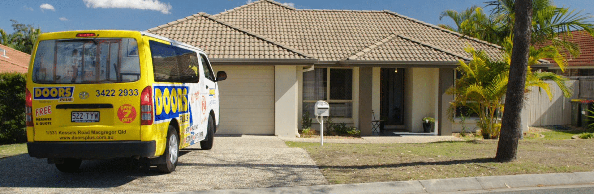 doors plus delivery van arriving at a home