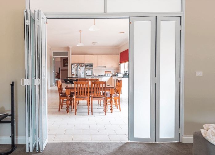 Doors Plus Aluminium Zone Living Custom made Painted White 6 panel Bifold door for your Dinning Room