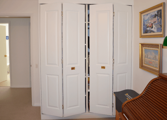 Doors Plus Internal Hollow Core Cupboard or wardrobe Painted white Bifold doors