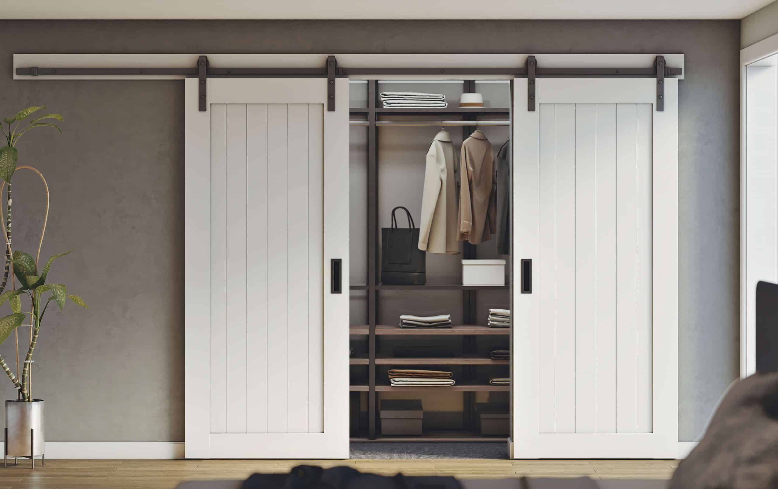 closet makeover with double white barn doors for the modern wardrobe