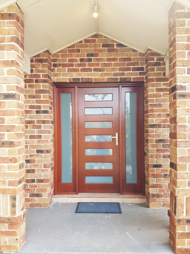 frost glass entry door with two sidepanels on either side of the door