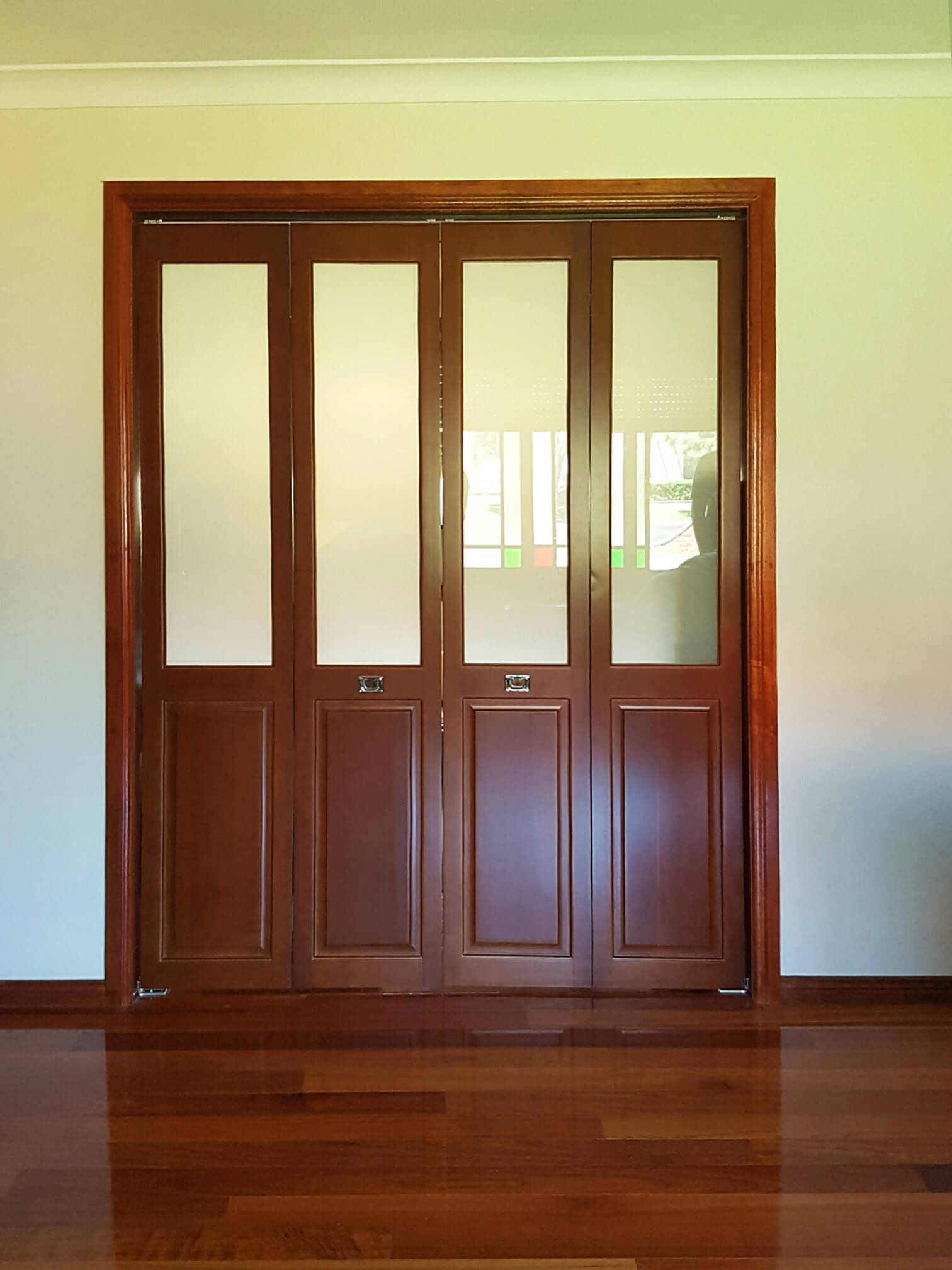 Doors Plus-Internal-Solid timber-pacific ash-Ashfield-double Bifold door-stained in dark maple-with translucent saefglass