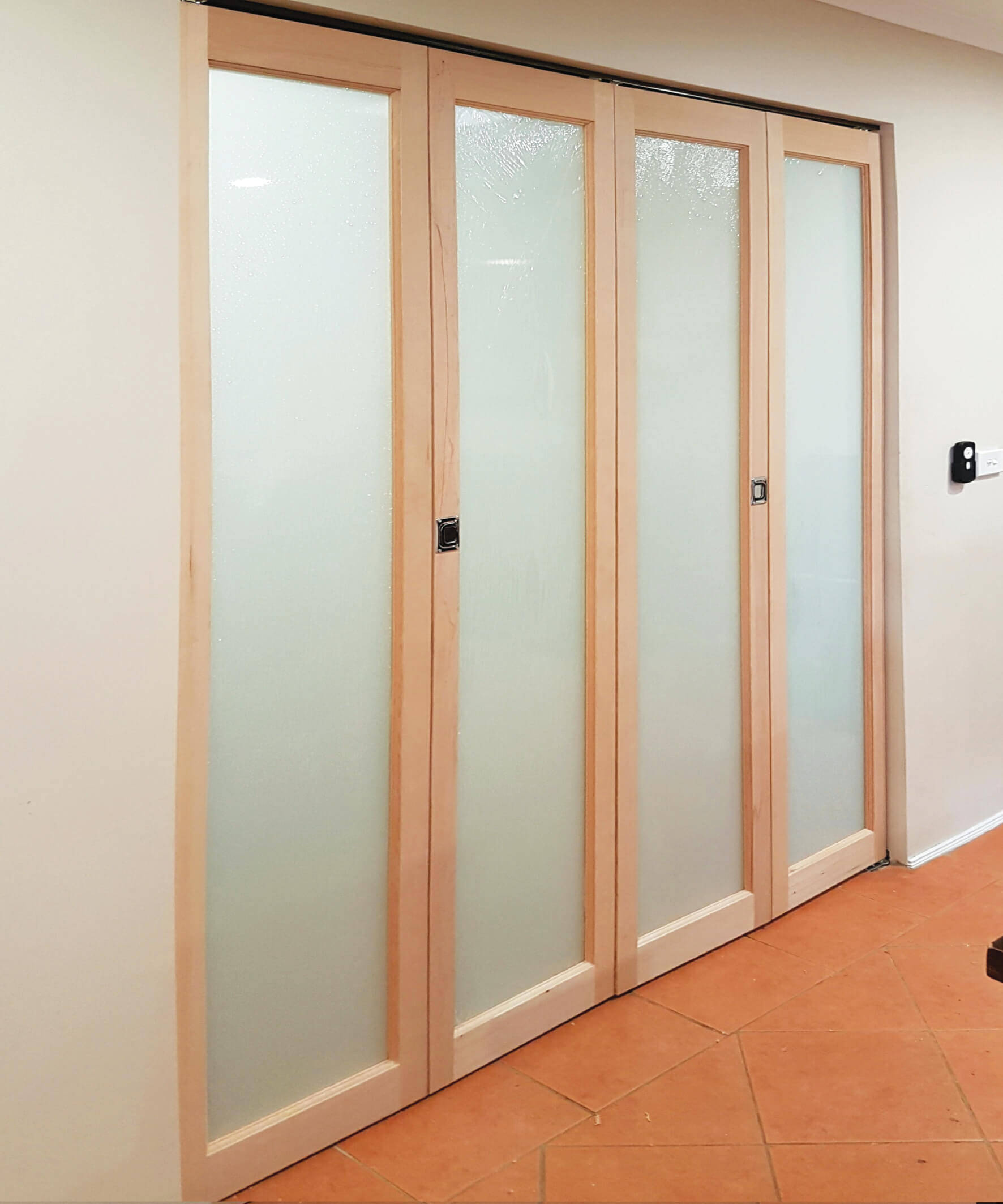 Doors Plus-Solid timber-Pacific Ash-Ashfield-Translucent safeglass-Double Bifold doors