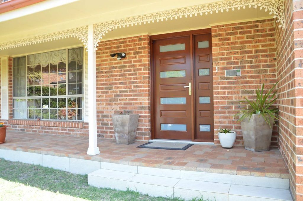 Aesthetics of a Front Door Design - Showing Timber Front door Stained with Matching Sidepanel