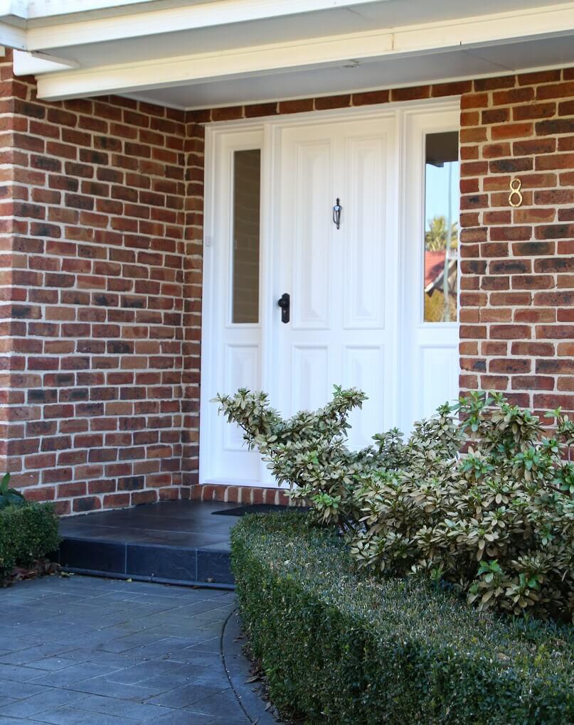 an entry door with two matching sidepanels with Insulsafe Safeglass from Doors Plus