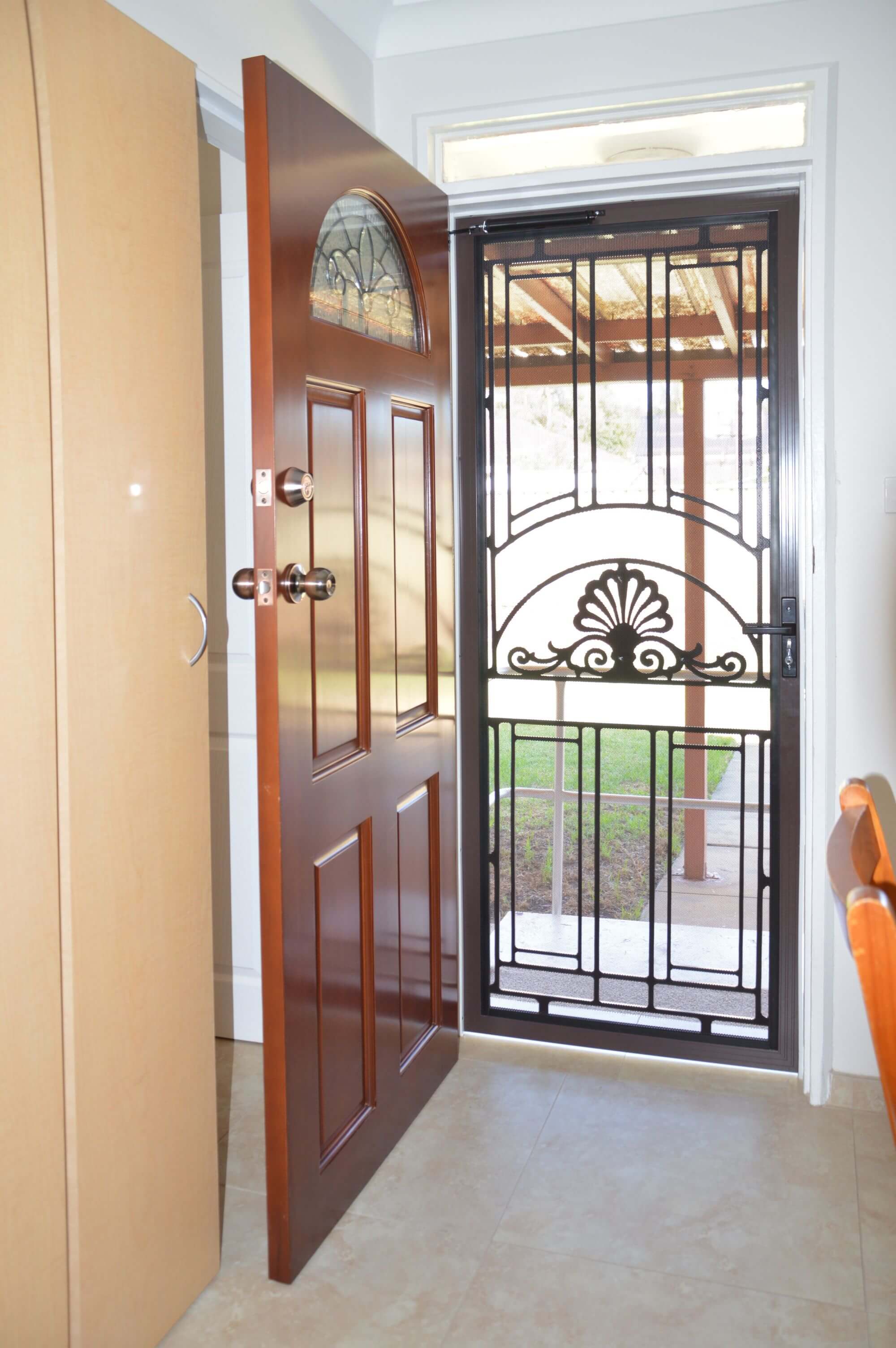 Doors Plus-External-Entrance-Nubreeze-Safety screen hinged door-with grill design on it-in black finish