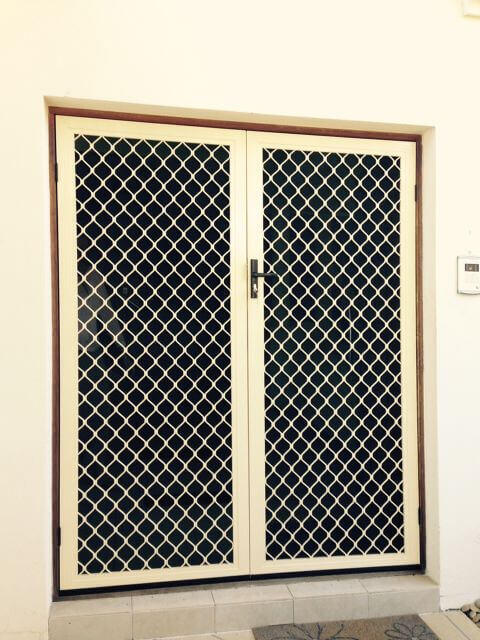 Doors Plus-External-Safety screen double door-with grill design on it-in primrose finish