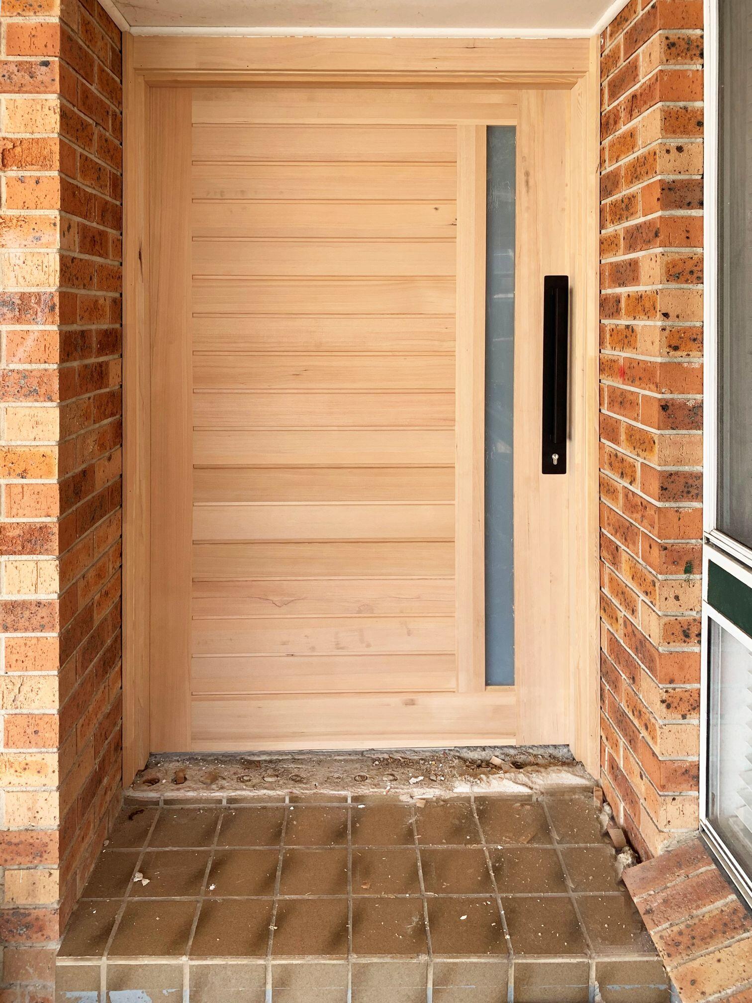 Doors Plus Entrance Californian Solid Timber Engineered wide custom door with black pull handle