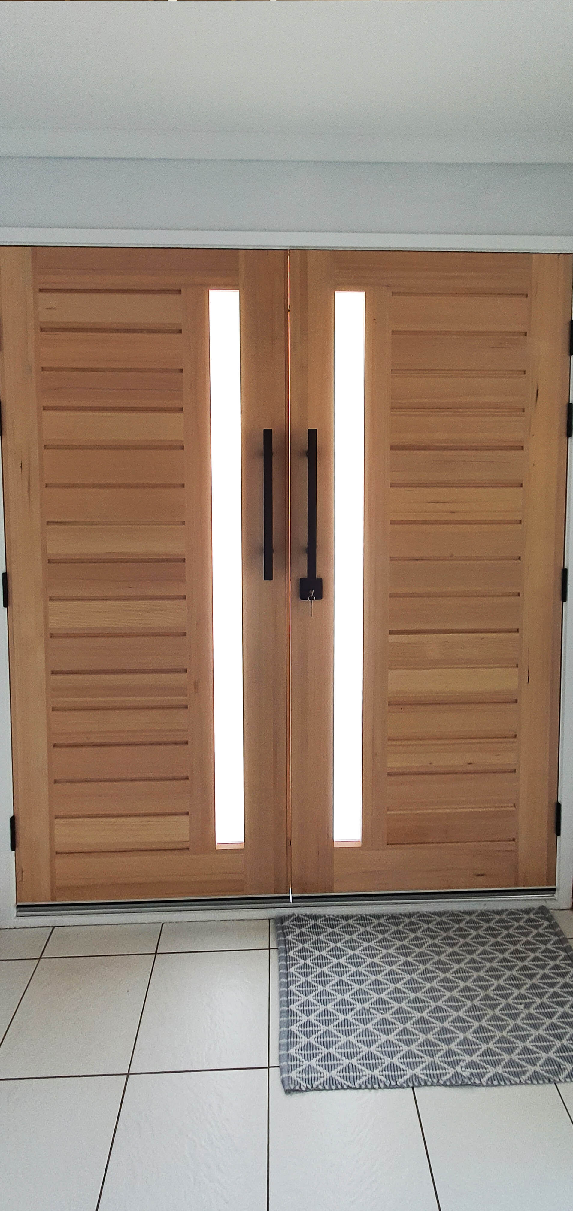 Doors Plus Entrance Raw Californian Solid Timber Engineered double door with Black pull handle