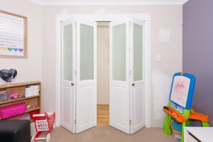 Internal White Double Bi-fold Doors with Glass Panes