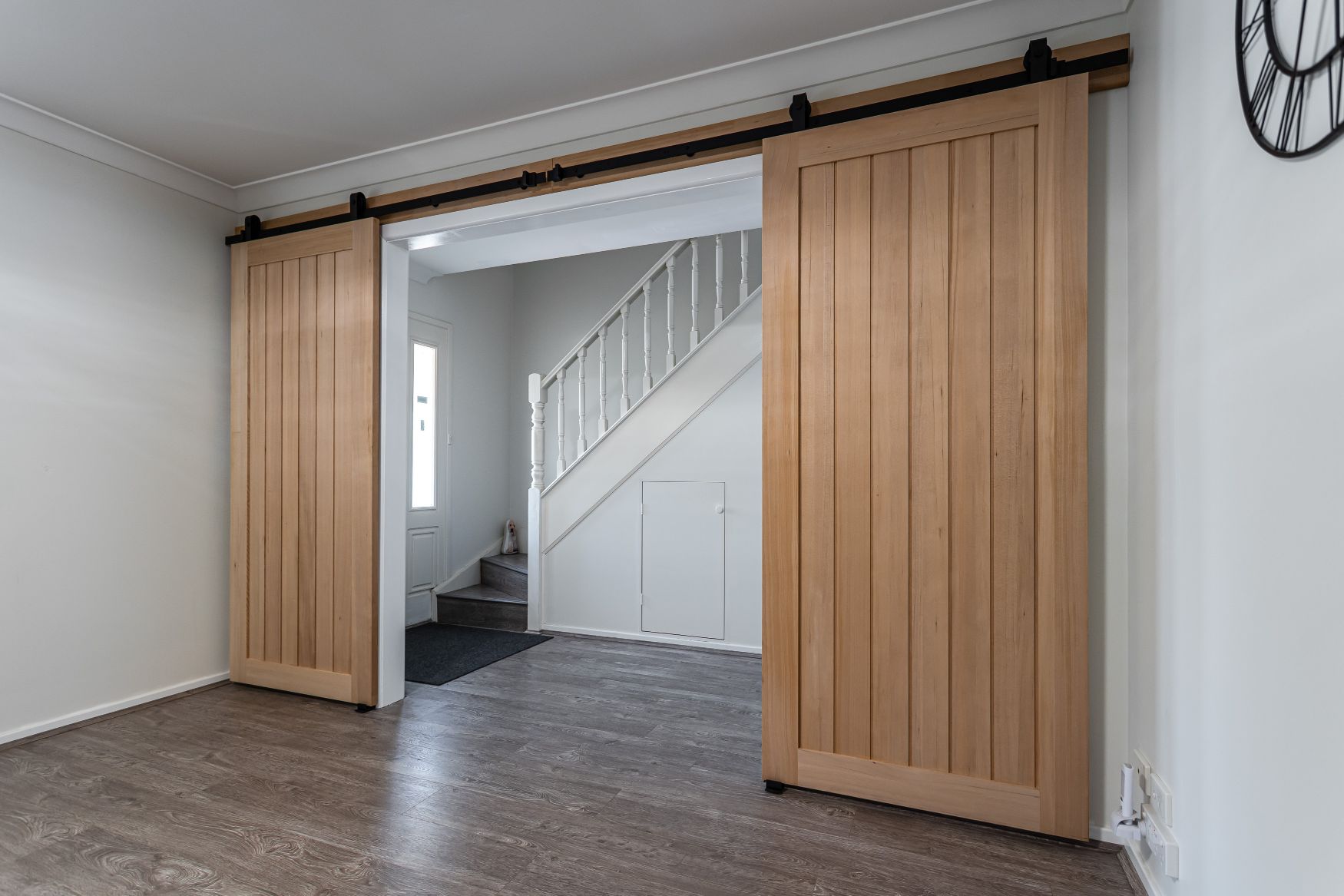 Internal Barn Double Door in Natural Finish with Black Carbon Steel Tracks