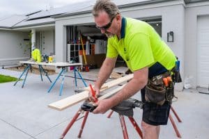 Doors Plus - Installer Preparing Barn Track for Installation