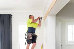 Doors Plus - Installer Drilling Timber Frame for Sliding Door