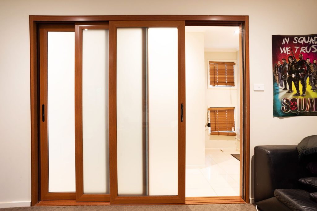 Doors Plus - Internal Aluminium Slider Door with Translucent Glass - Wood Grain Finish