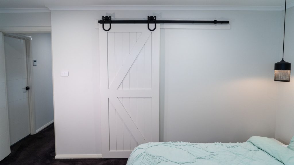 Doors Plus - Internal barn door with Carbon Black Track - Painted White