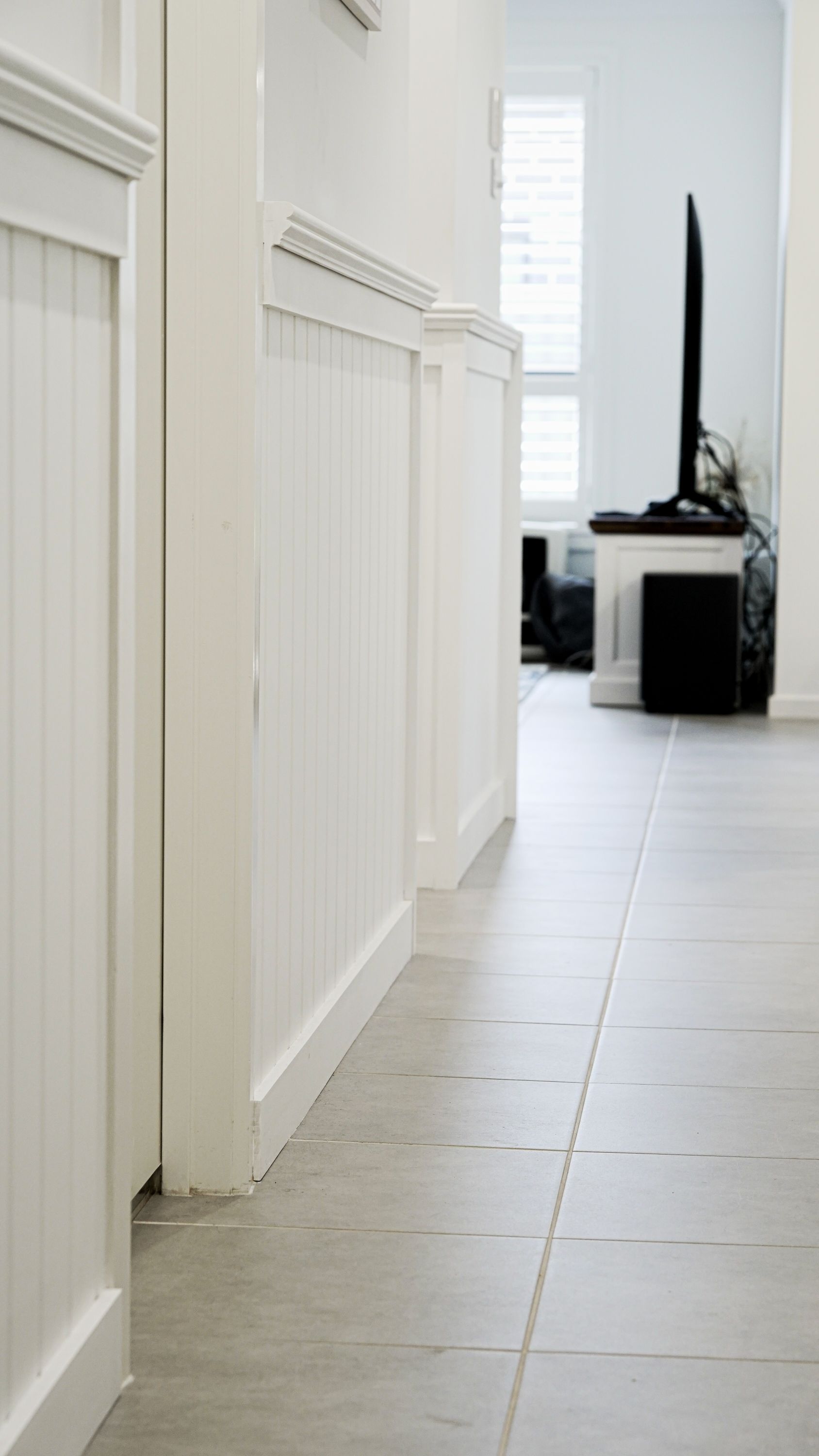 Doors Plus - Wainscoting - Hallway Leading to Media Room