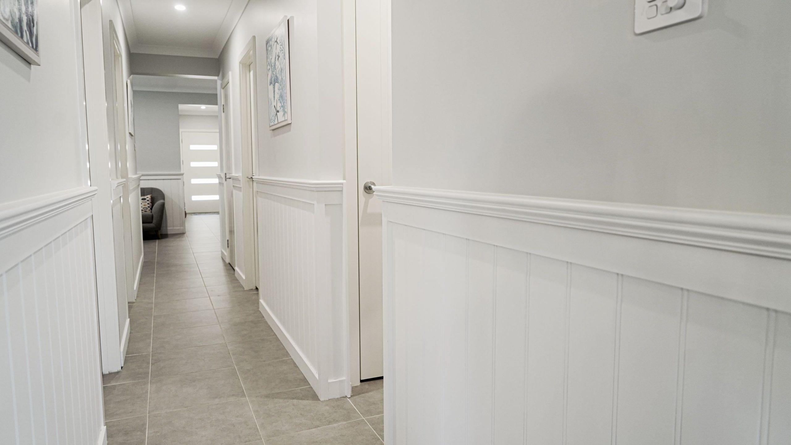Doors Plus - Wainscoting - Hallway leading to Bedrooms and Front Door