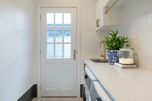 Doors Plus - 9 Lite French Door Featuring Clear Glass in Laundry - Painted White