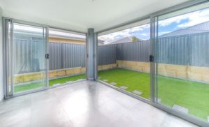 Doors Plus - Insulation of Sliding Doors Leading to Backyard Using Weather Strip
