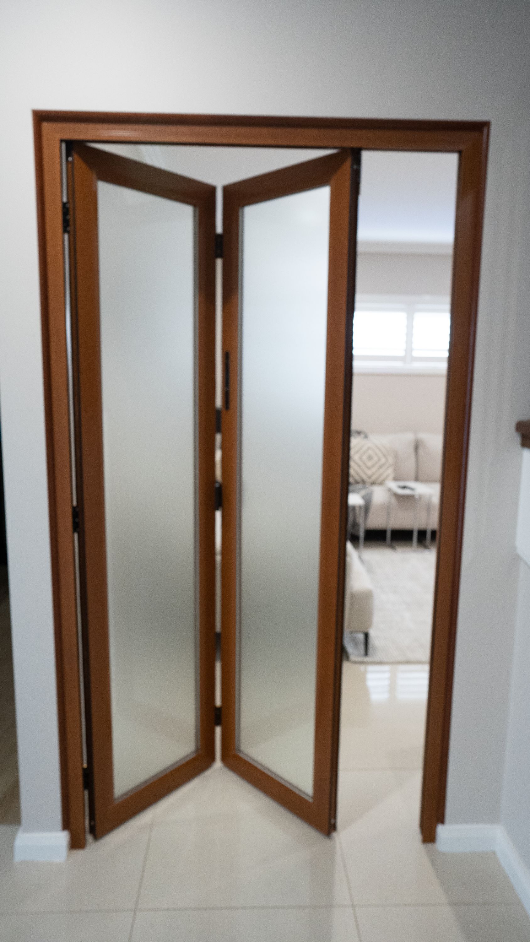 Doors Plus - 2 Panle Bifold Aluminium Zone Living Installed in Living Room