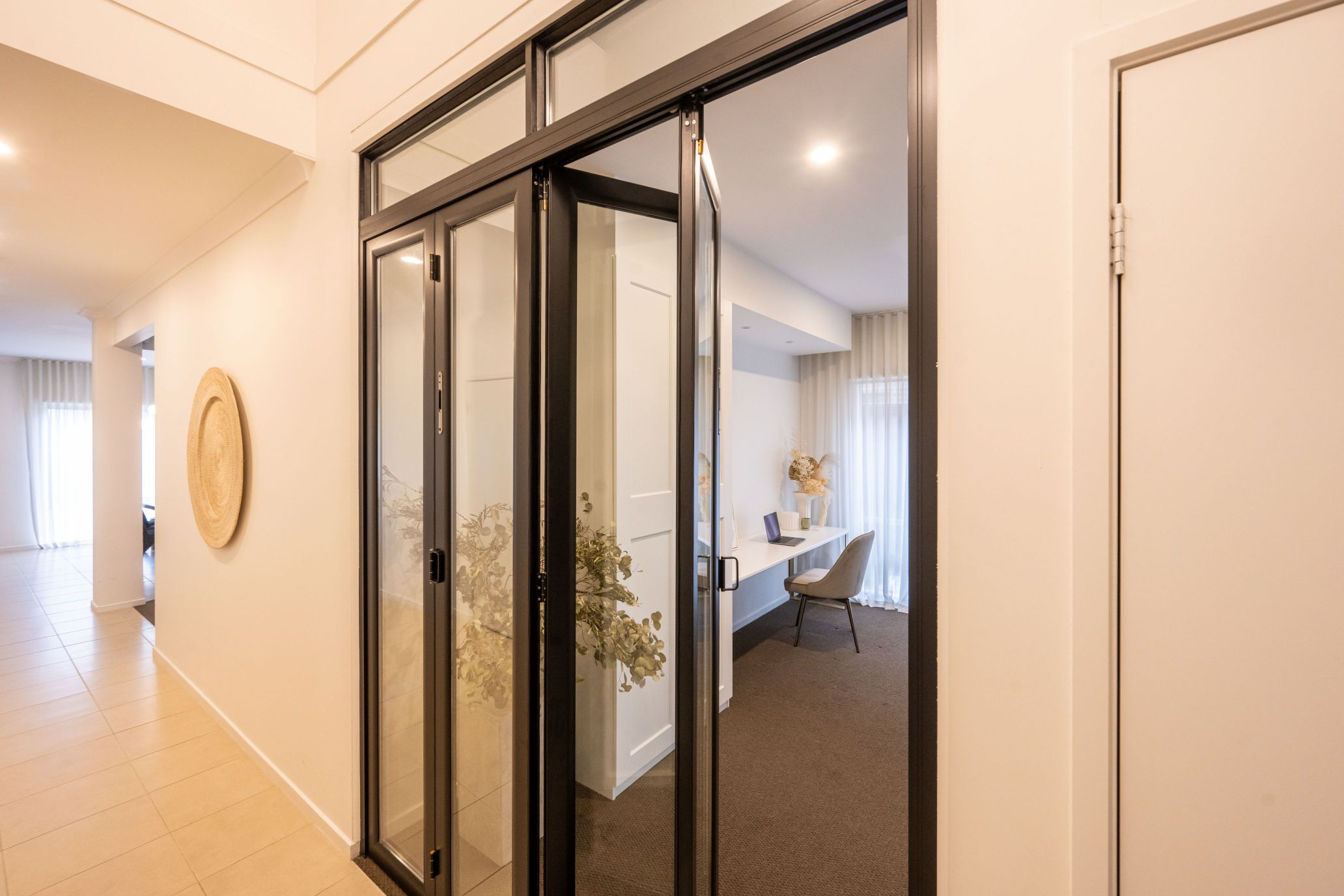 Doors Plus - 4 Panel Zone Living Bifold Door Installed in Home Office