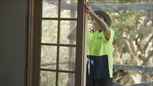 Doors Plus - Installer Fixing French Door in Door Frame