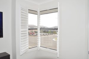 Doors Plus - Plantation Shutters in Corner Window