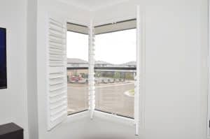 Doors Plus - Plantation Shutters in Corner Window