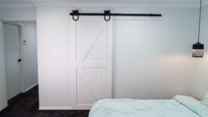 Doors Plus - Sliding Barn Door in Bedroom Closet