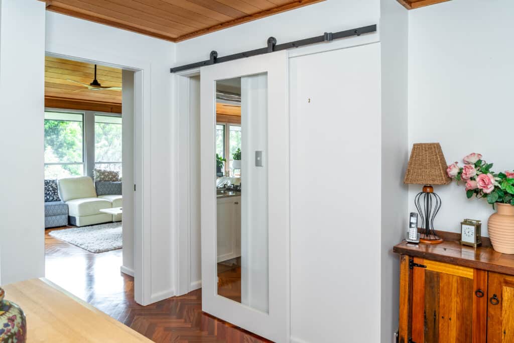 Doors Plus - Shaker Door on Barn Track with Glass Panel