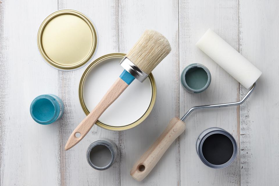 Paint cans and brushes