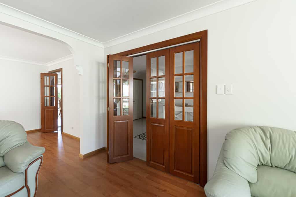 Doors Plus - Internal bifolds with Clear Glass - Dark Maple Stain