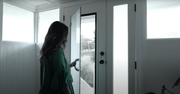 Doors Plus - Lady Opening the Door