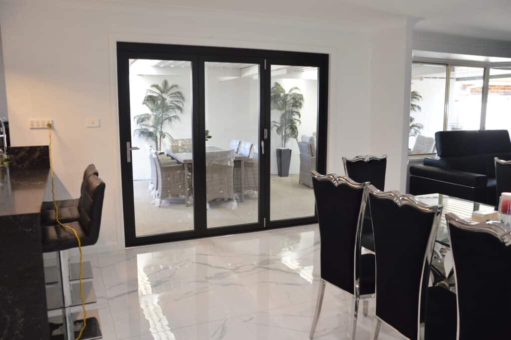 Doors Plus - Black bifold aluminium doors