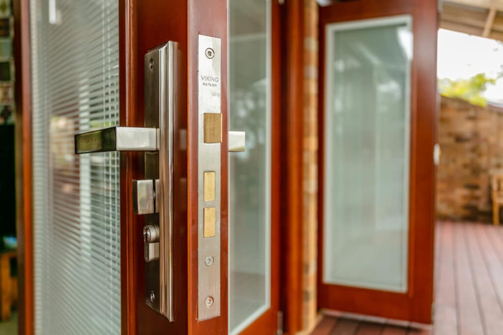 Doors Plus - multiple locking mechanism for bifold doors