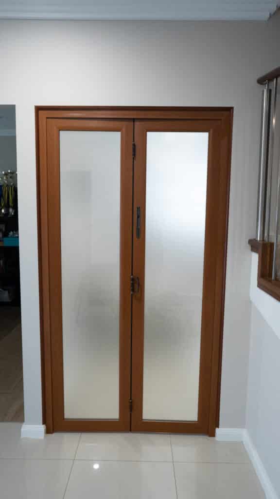 Doors Plus - Aluminium Bifold Doors in Small Laundry Opening