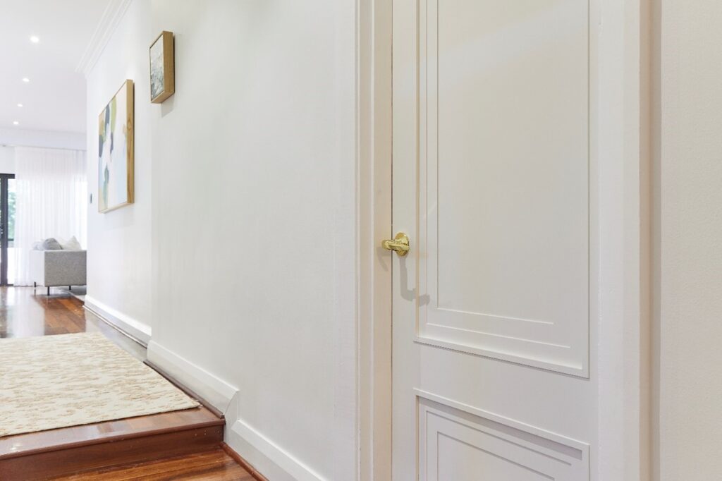 Doors Plus - White Door with Gold Hardware