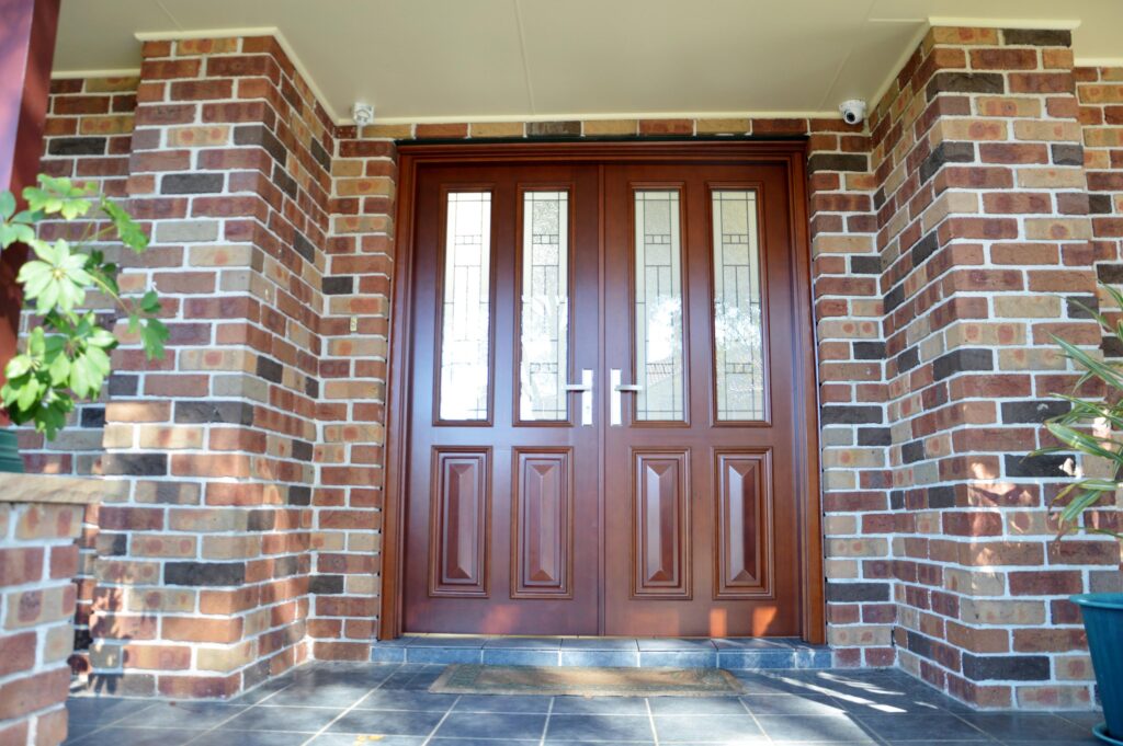 Doors Plus - Double Doors - Dark Maple - Traditional Brick House