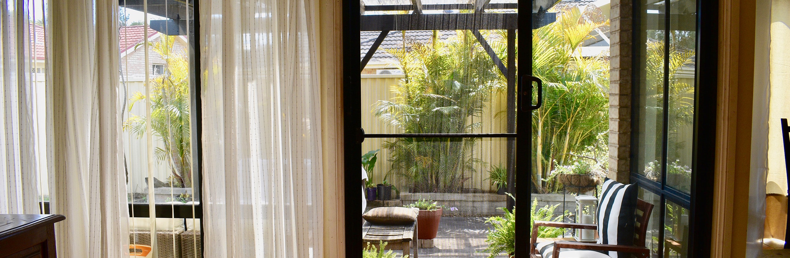 Doors Plus - Sliding Door in Backyard - Black - Large