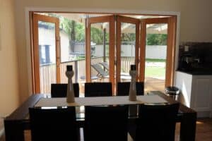 Doors Plus - Timber Bifold Doors - Stained Dark Maple
