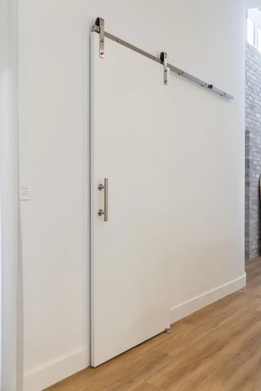 Doors Plus Internal Door on Sitainless Steel Barn track Theatre Room