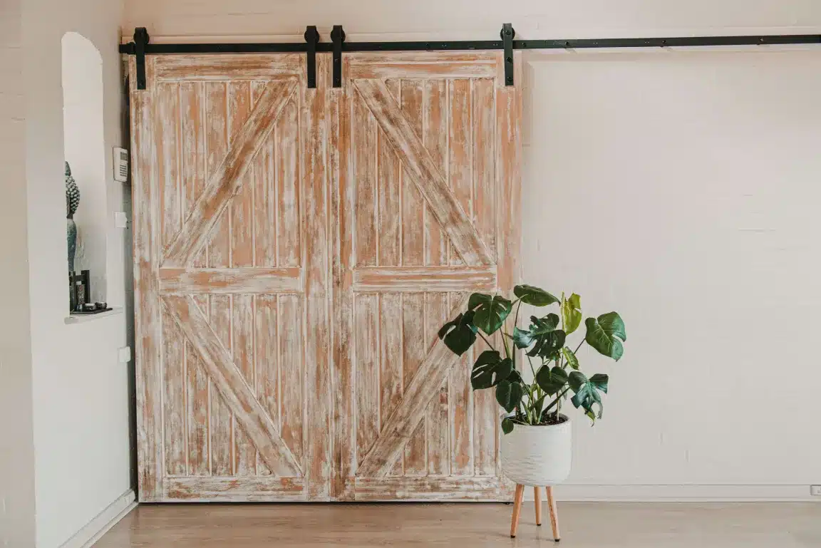 Doors Plus Internal Solid timber Glengary Barn Sliding Double door with clear stain on Black Barn long wide track and fittings store room